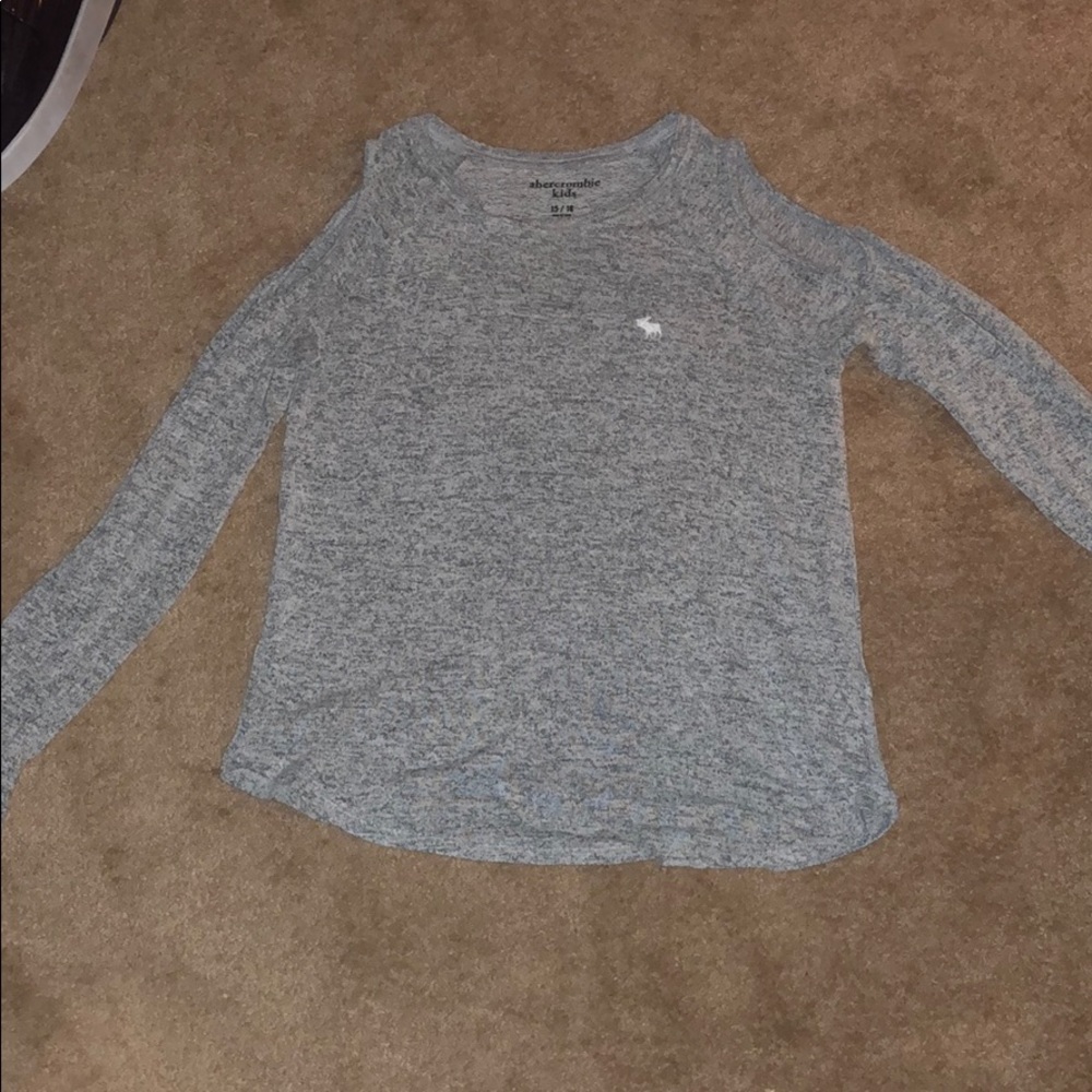 one 15/16 sized, gray, long sleeved, cold shoulder